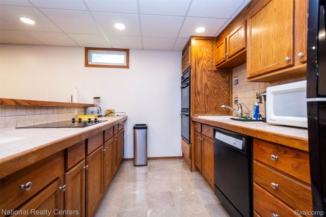 8706 Buckland Drive, Northfield Township, MI 48178