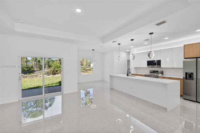 220 Lomax Avenue, Lehigh Acres, FL 33974