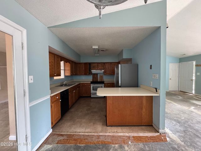 102 NW 20th Street, Oak Island, NC 28465