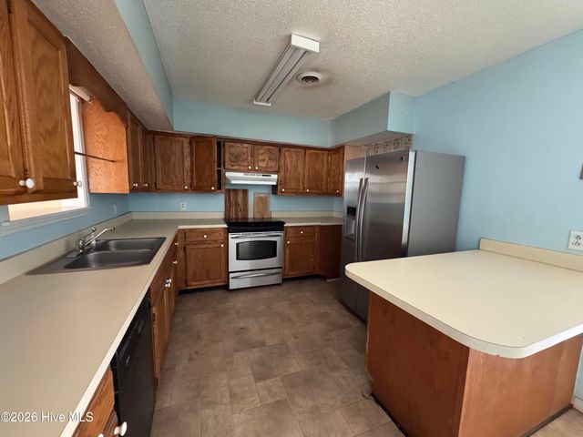 102 NW 20th Street, Oak Island, NC 28465