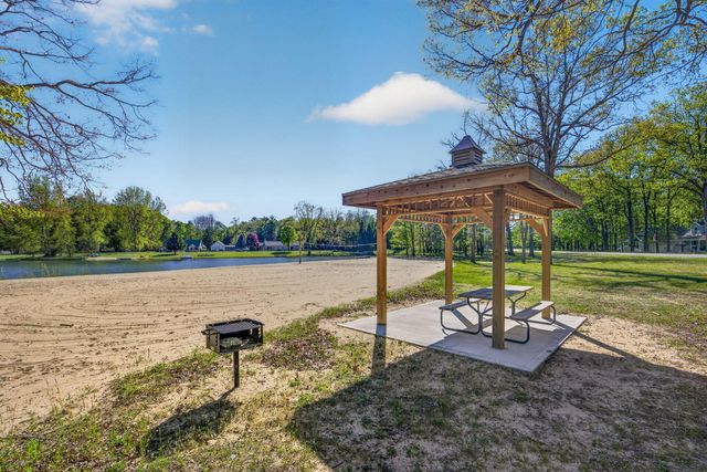 6908 Club House Drive E, Canadian Lakes, MI 49346