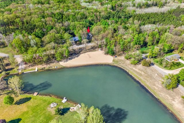 6908 Club House Drive E, Canadian Lakes, MI 49346
