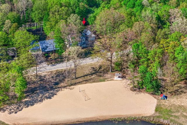 6908 Club House Drive E, Canadian Lakes, MI 49346