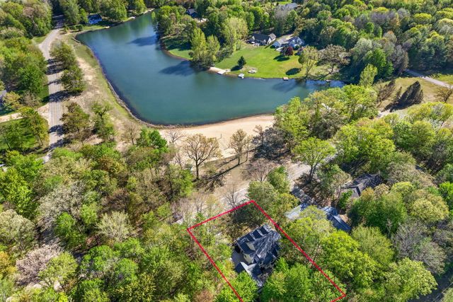 6908 Club House Drive E, Canadian Lakes, MI 49346