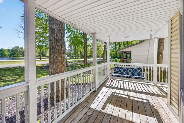 6908 Club House Drive E, Canadian Lakes, MI 49346
