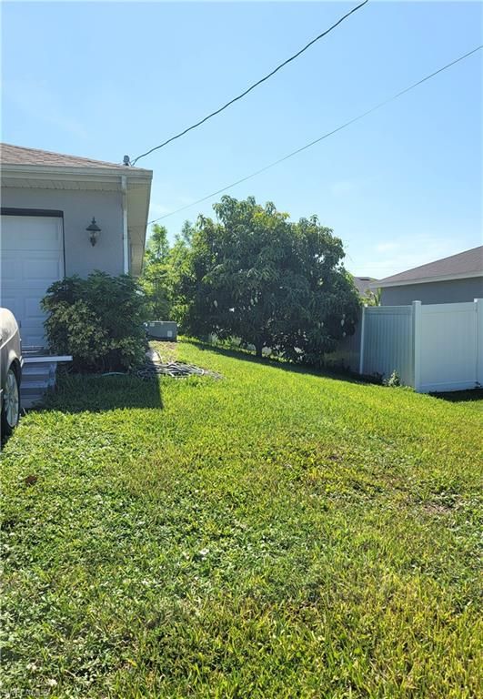 313 SW 14th PL, CAPE CORAL, FL 33991 — photo 3