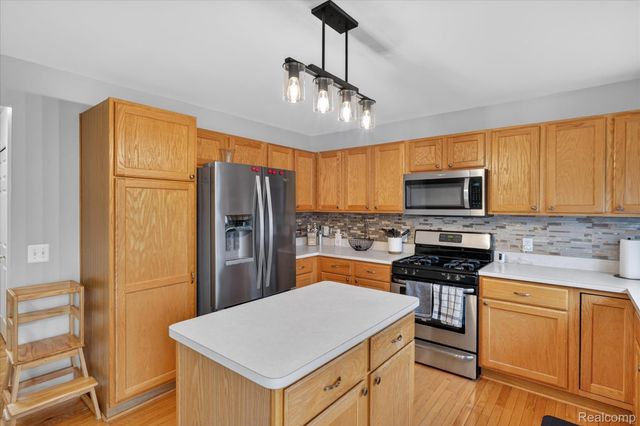 6140 Blue Heron Drive, Genoa Township, MI 48843