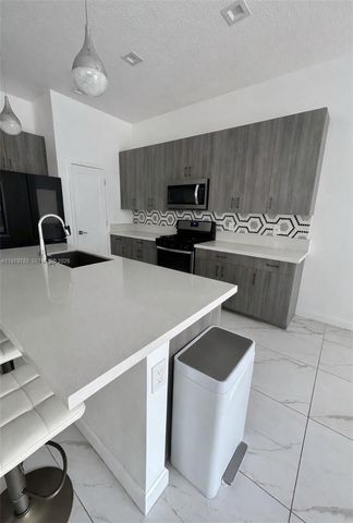 4980 Whispering Way -, Dania Beach, FL 33312