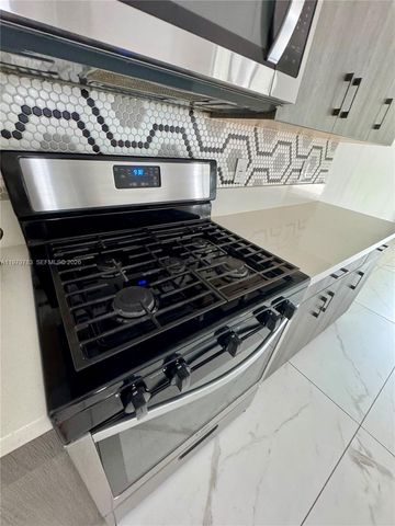 4980 Whispering Way -, Dania Beach, FL 33312