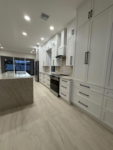 8676 Doverbrook Drive, Palm Beach Gardens, FL 33410