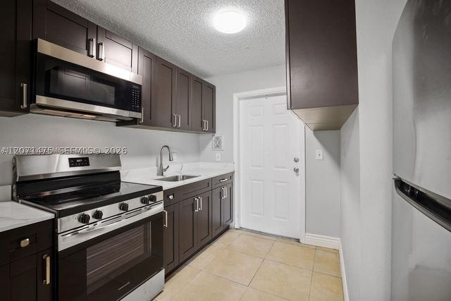 850 E Commercial Blvd 214B, Oakland Park, FL 33334