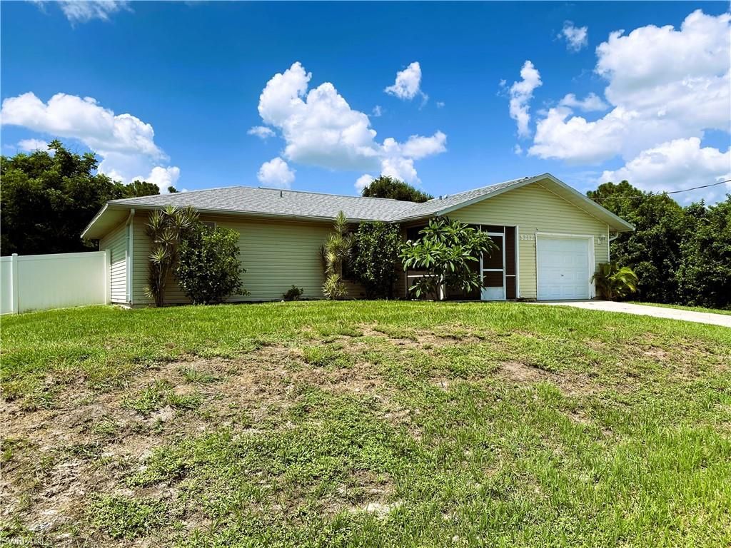 5212 3rd ST W, Lehigh Acres, FL 33971