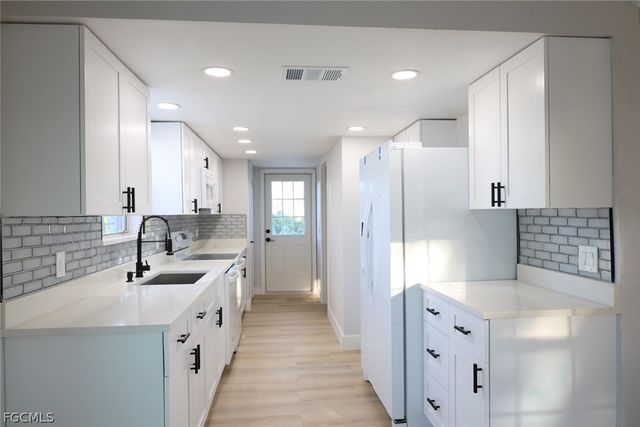 3906 28th ST SW, Lehigh Acres, FL 33976