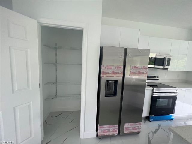 409 Limerick AVE S, Lehigh Acres, FL 33974