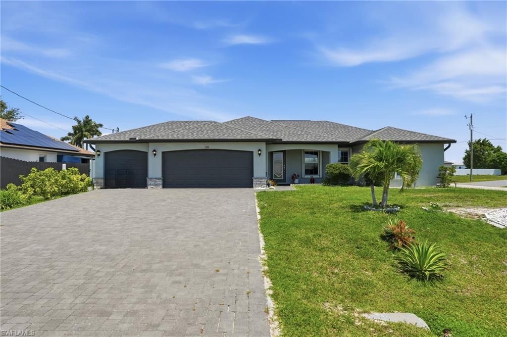 Image 1 of property listing at 1201 NW 14th PL, Cape Coral, FL 33993