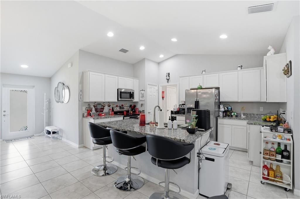 Image 10 of property listing at 1201 NW 14th PL, Cape Coral, FL 33993