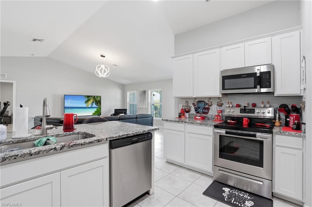 Image 11 of property listing at 1201 NW 14th PL, Cape Coral, FL 33993
