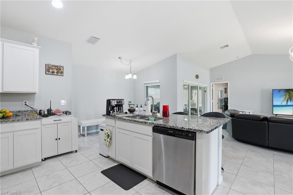 Image 12 of property listing at 1201 NW 14th PL, Cape Coral, FL 33993
