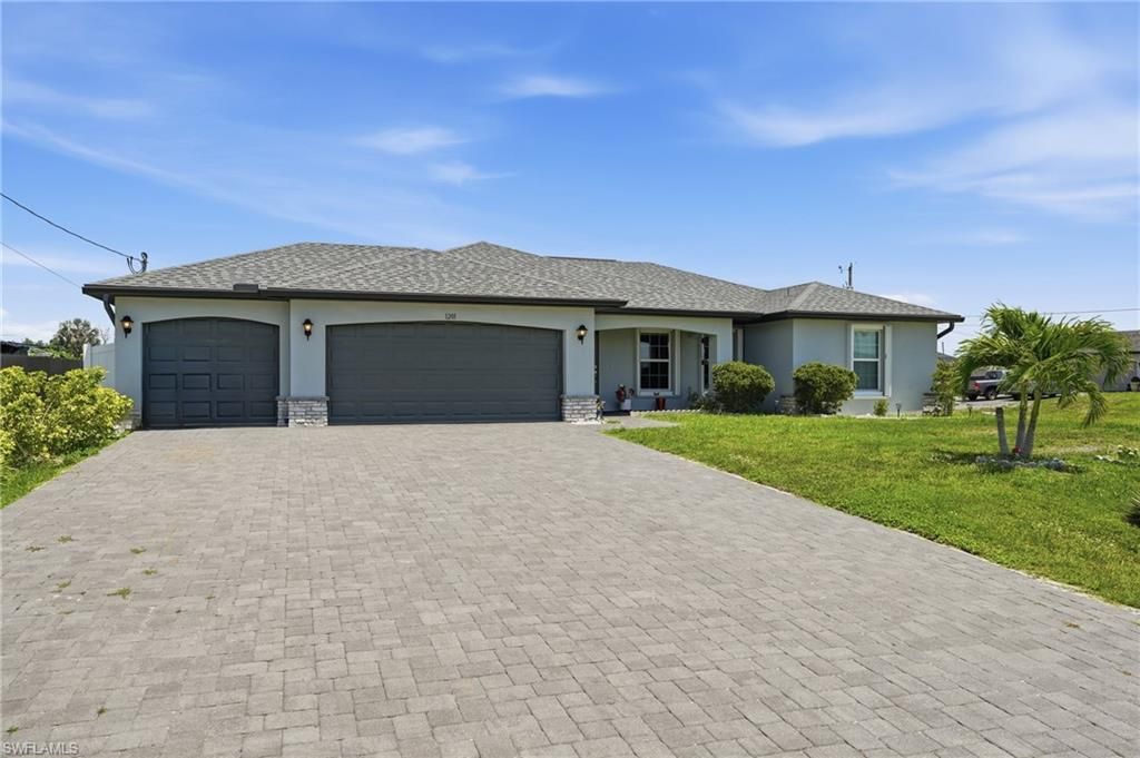 Image 2 of property listing at 1201 NW 14th PL, Cape Coral, FL 33993