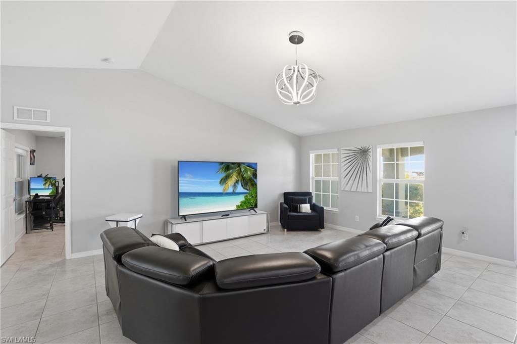 Image 5 of property listing at 1201 NW 14th PL, Cape Coral, FL 33993