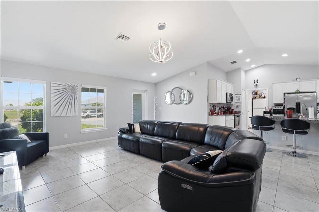 Image 7 of property listing at 1201 NW 14th PL, Cape Coral, FL 33993