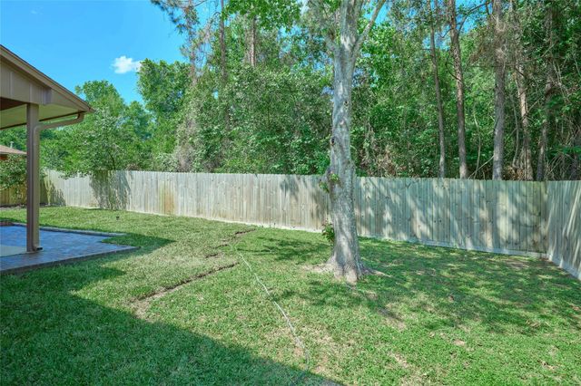 80 Rolling Hills Drive, Conroe, TX 77304