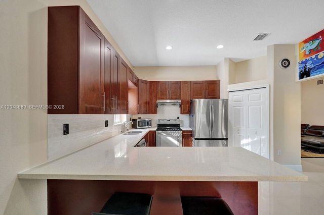 14003 N Cypress Cove Circle, Davie, FL 33325