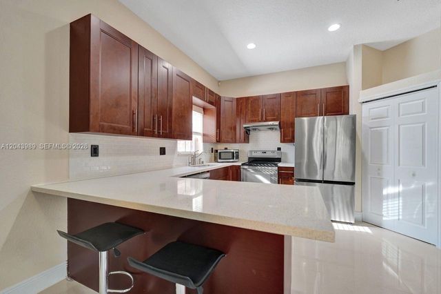 14003 N Cypress Cove Circle, Davie, FL 33325