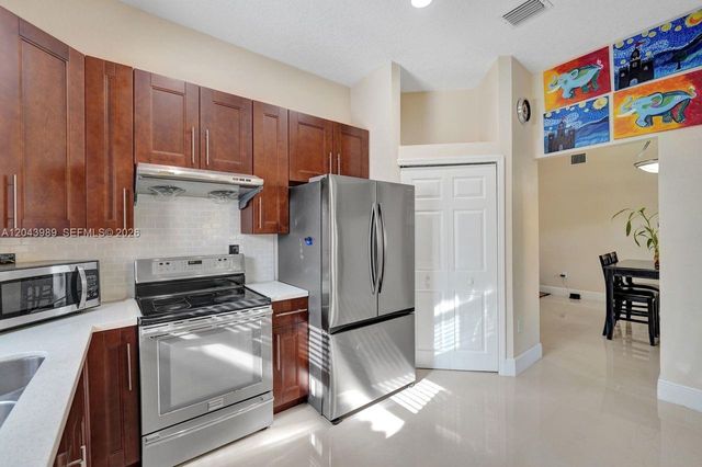 14003 N Cypress Cove Circle, Davie, FL 33325
