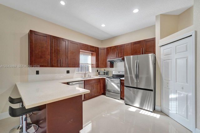 14003 N Cypress Cove Circle, Davie, FL 33325