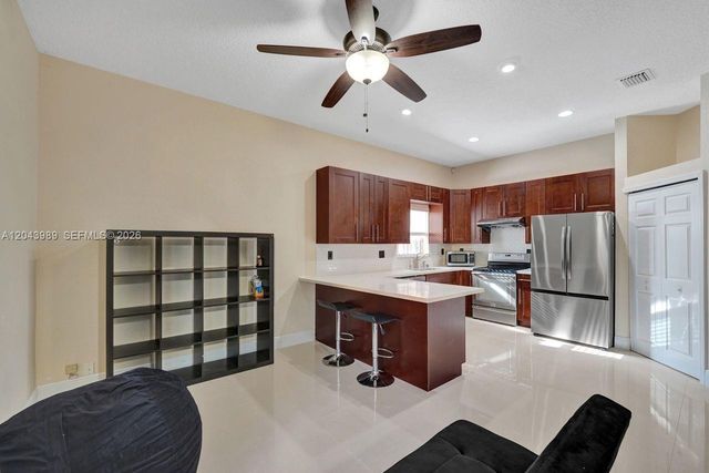 14003 N Cypress Cove Circle, Davie, FL 33325