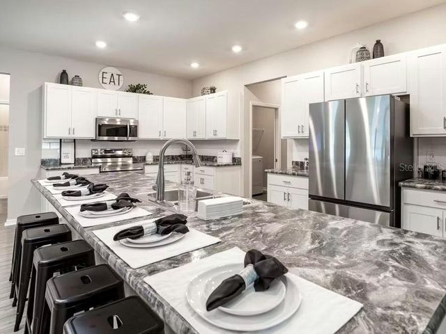 8673 WILDFLOWER FIELD LANE, Wildwood, FL 34785