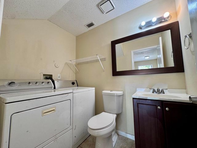704 Riverside Drive, Greenacres, FL 33463