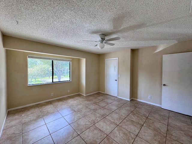 704 Riverside Drive, Greenacres, FL 33463