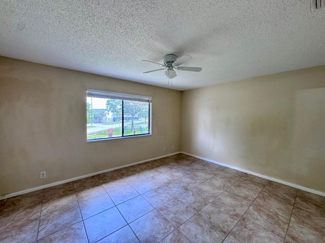 704 Riverside Drive, Greenacres, FL 33463
