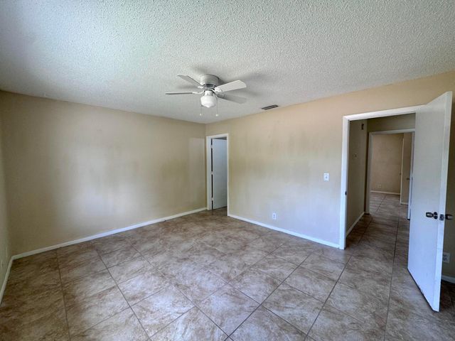 704 Riverside Drive, Greenacres, FL 33463