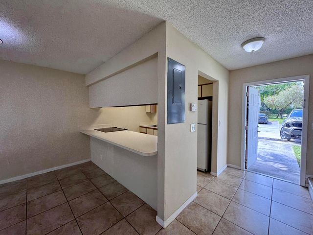 704 Riverside Drive, Greenacres, FL 33463