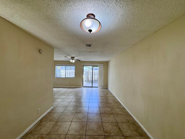 704 Riverside Drive, Greenacres, FL 33463
