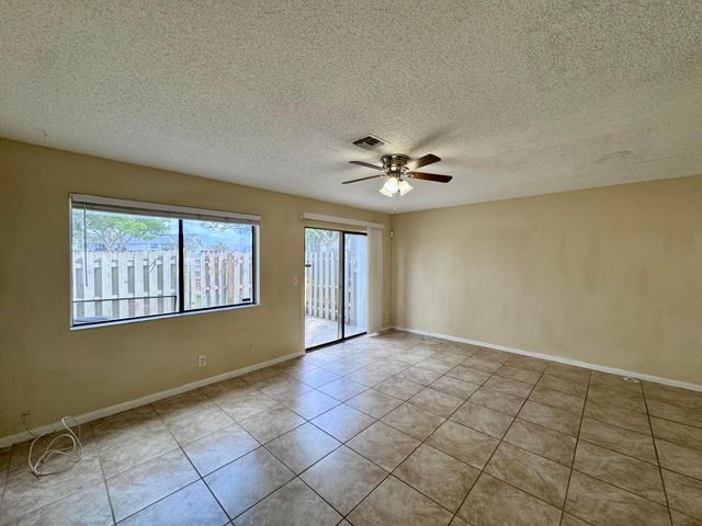 704 Riverside Drive, Greenacres, FL 33463