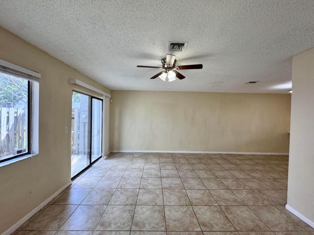 704 Riverside Drive, Greenacres, FL 33463