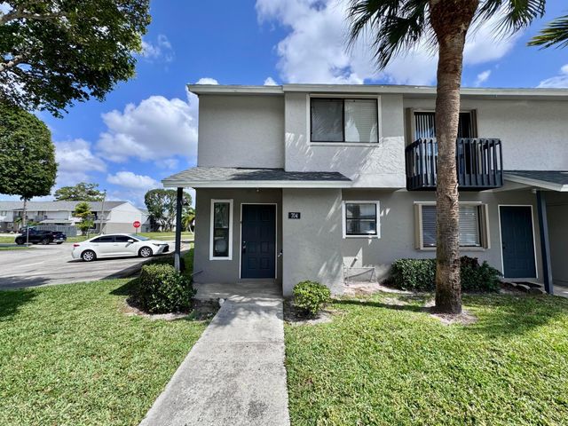 704 Riverside Drive, Greenacres, FL 33463