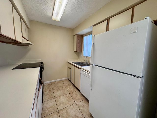 704 Riverside Drive, Greenacres, FL 33463