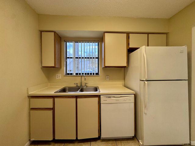 704 Riverside Drive, Greenacres, FL 33463