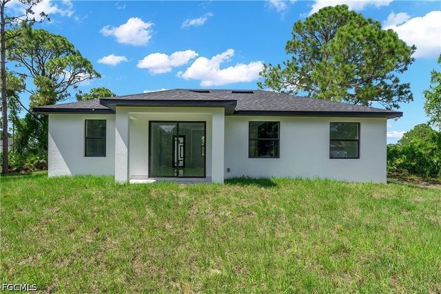 1030 Hunter ST E, Lehigh Acres, FL 33974