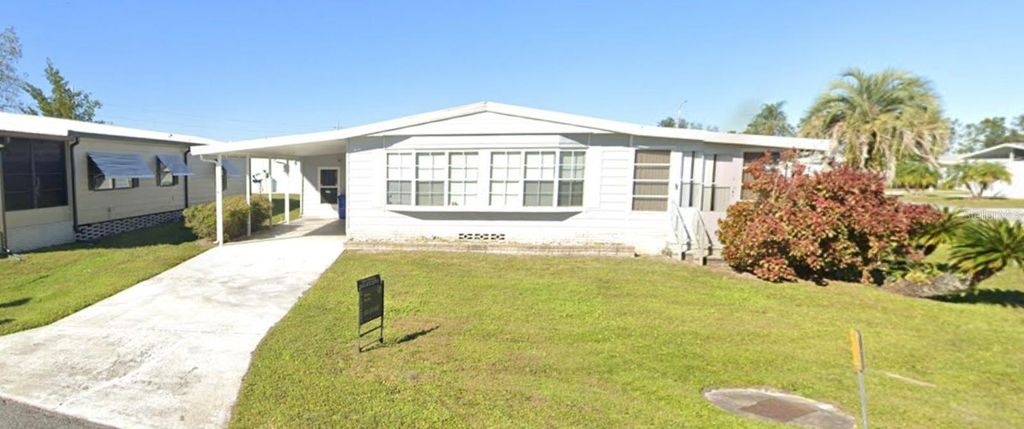 Image 2 of property listing at 6433 JACARANDA AVENUE NE, Winter Haven, FL 33881
