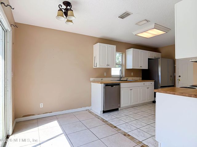 121 WHIPPOORWILL Drive, Palm Coast, FL 32164