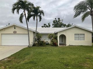 6269 Woodbury Road, Boca Raton, FL 33433