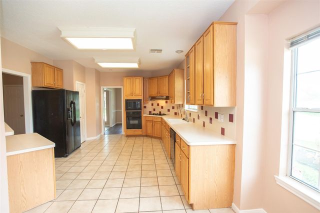 8615 Mile Run Road, Humble, TX 77346