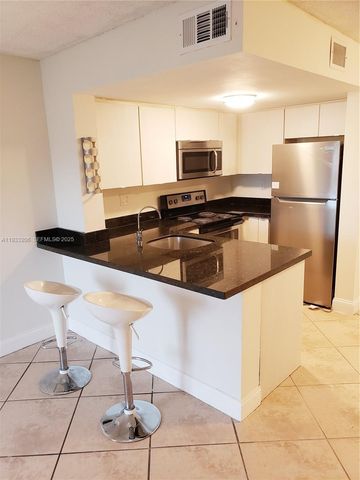 8660 NW 5th Ter 15-209, Miami, FL 33126