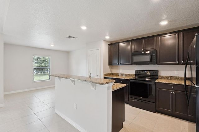 1665 LUFT LANE, Mascotte, FL 34753
